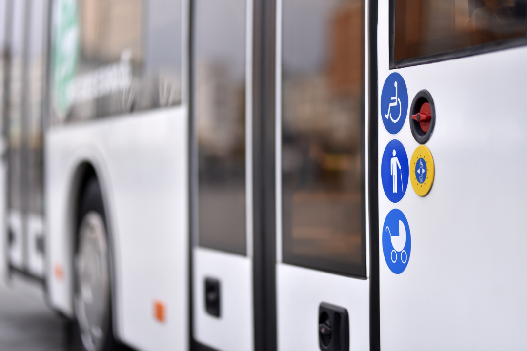 bus doors with button for opening doors for disabled people, the elderly and people with prams